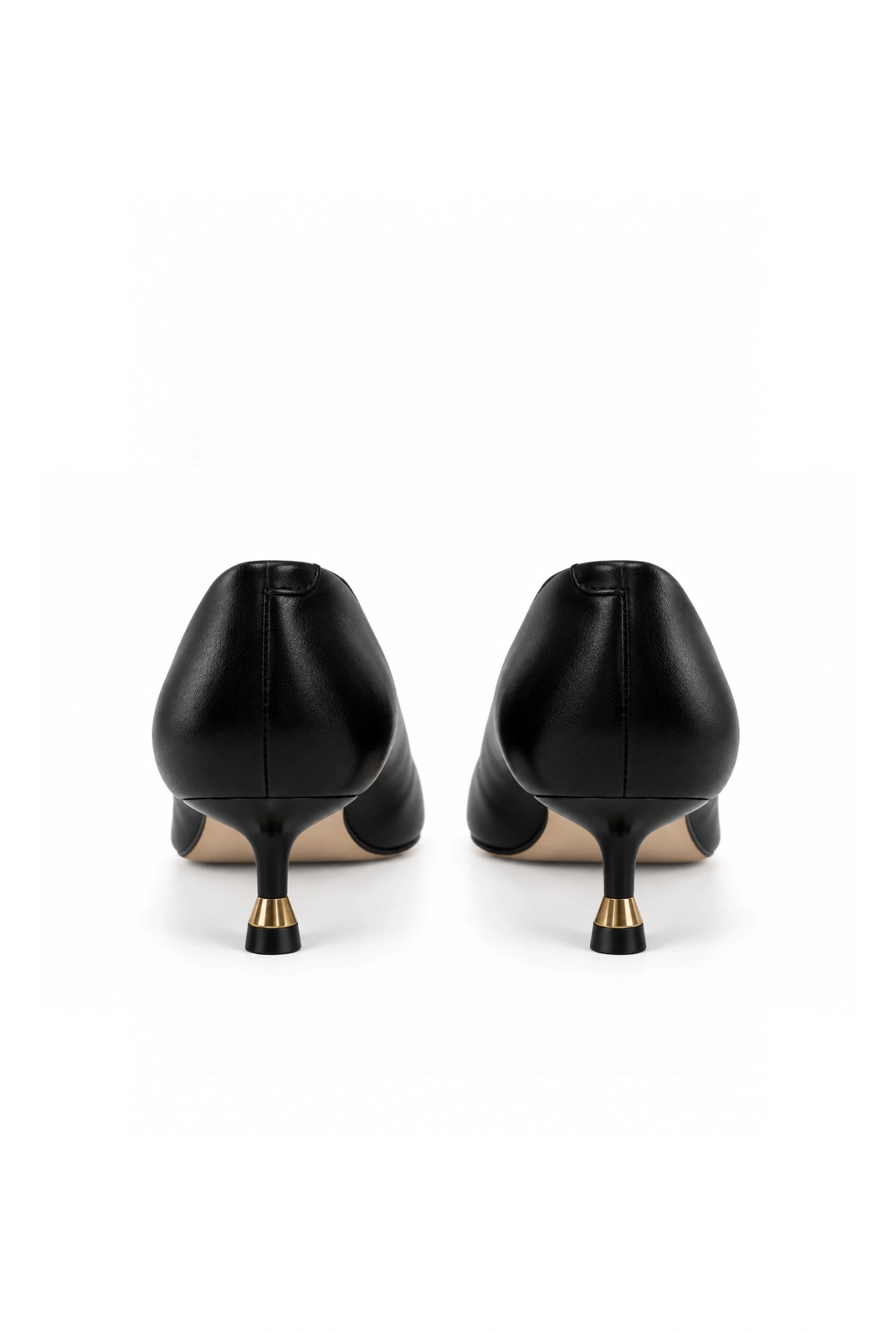 Samos – black pumps with a gold heel detail